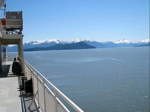 10-ifa-ferry-view-from.jpg - The coastal mountain range appeared on the horizon for all our ferry rides.  This is a view of the range on the way to Wrangell.  It may have been June but winter hangs on for a long time this far north.