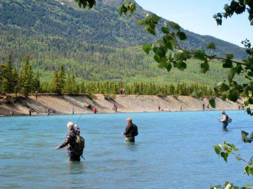 chug24.jpg - Anglers on near and opposite shores going after the salmon